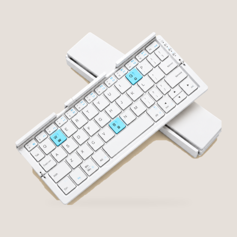 Mini foldable Bluetooth keyboard UAE – green aluminum alloy keyboard with hidden stand and phone propped up